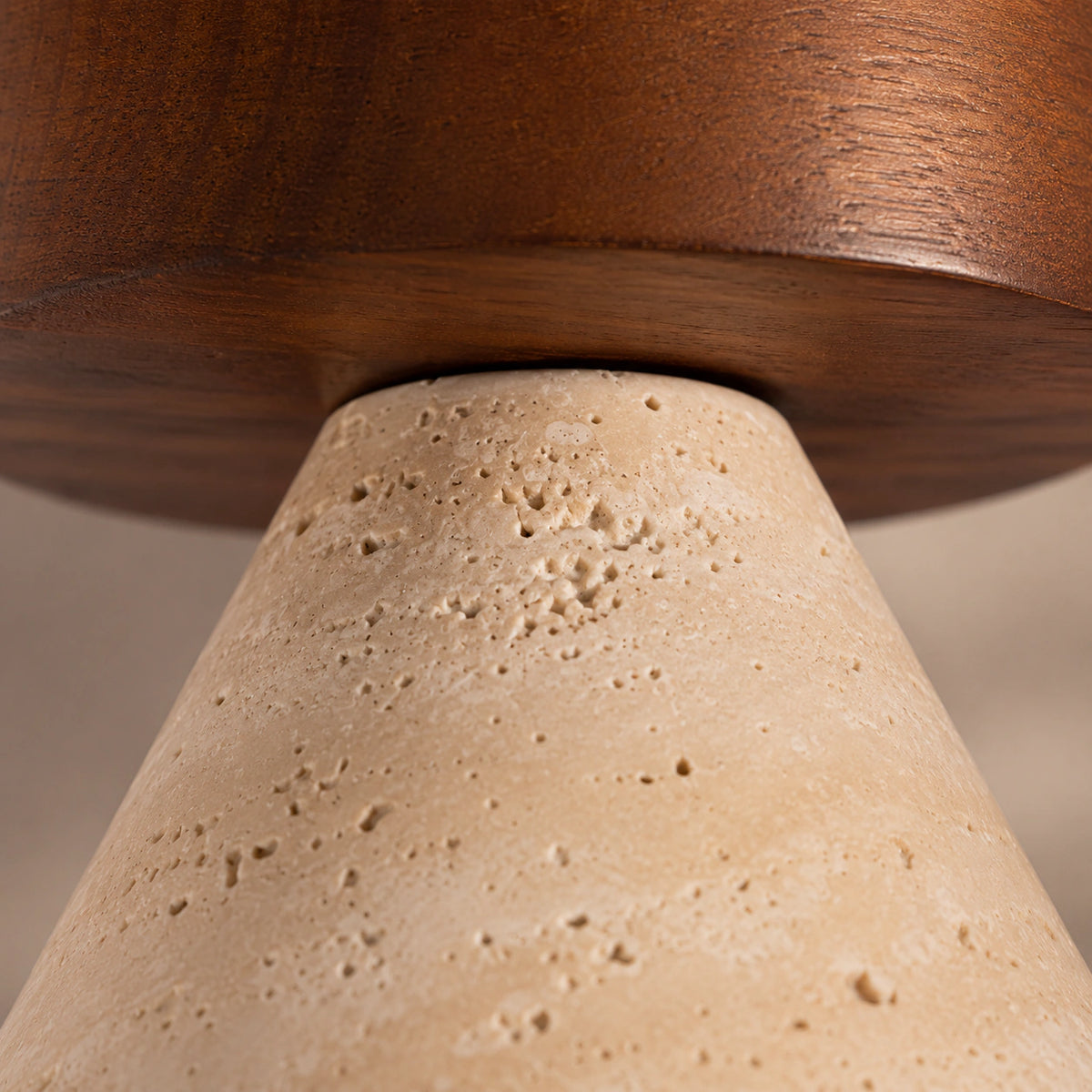 Close-up of the travertine grain on the cone ceiling light