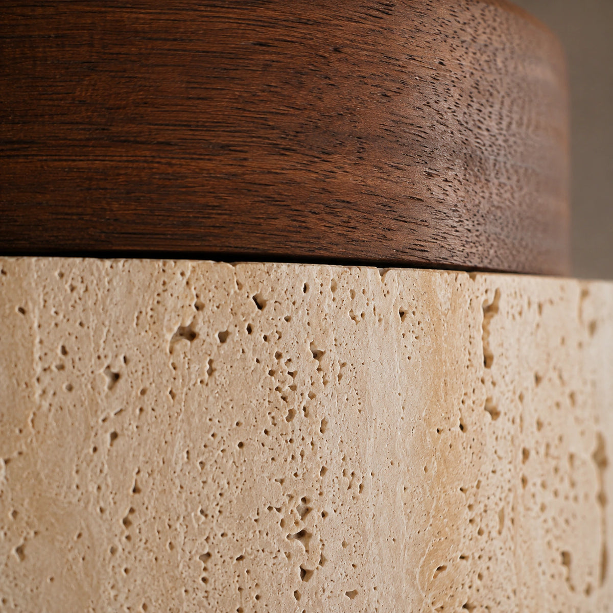Close-up of the travertine grain on the walnut version of the cube ceiling light