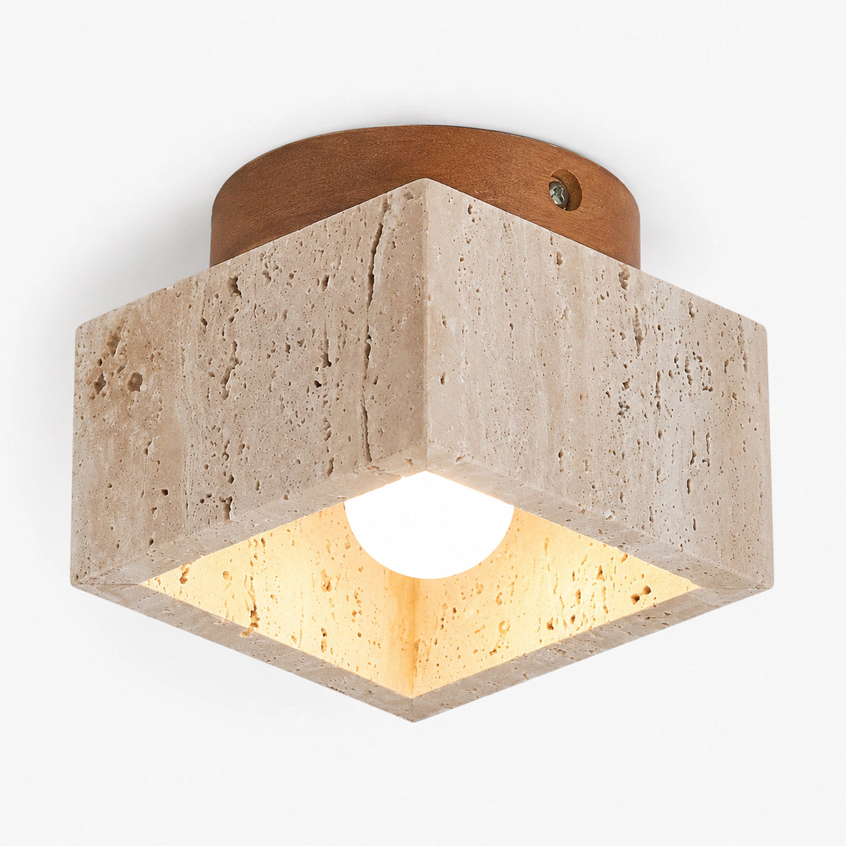 Travertine cube ceiling light with an oak collar on a white background