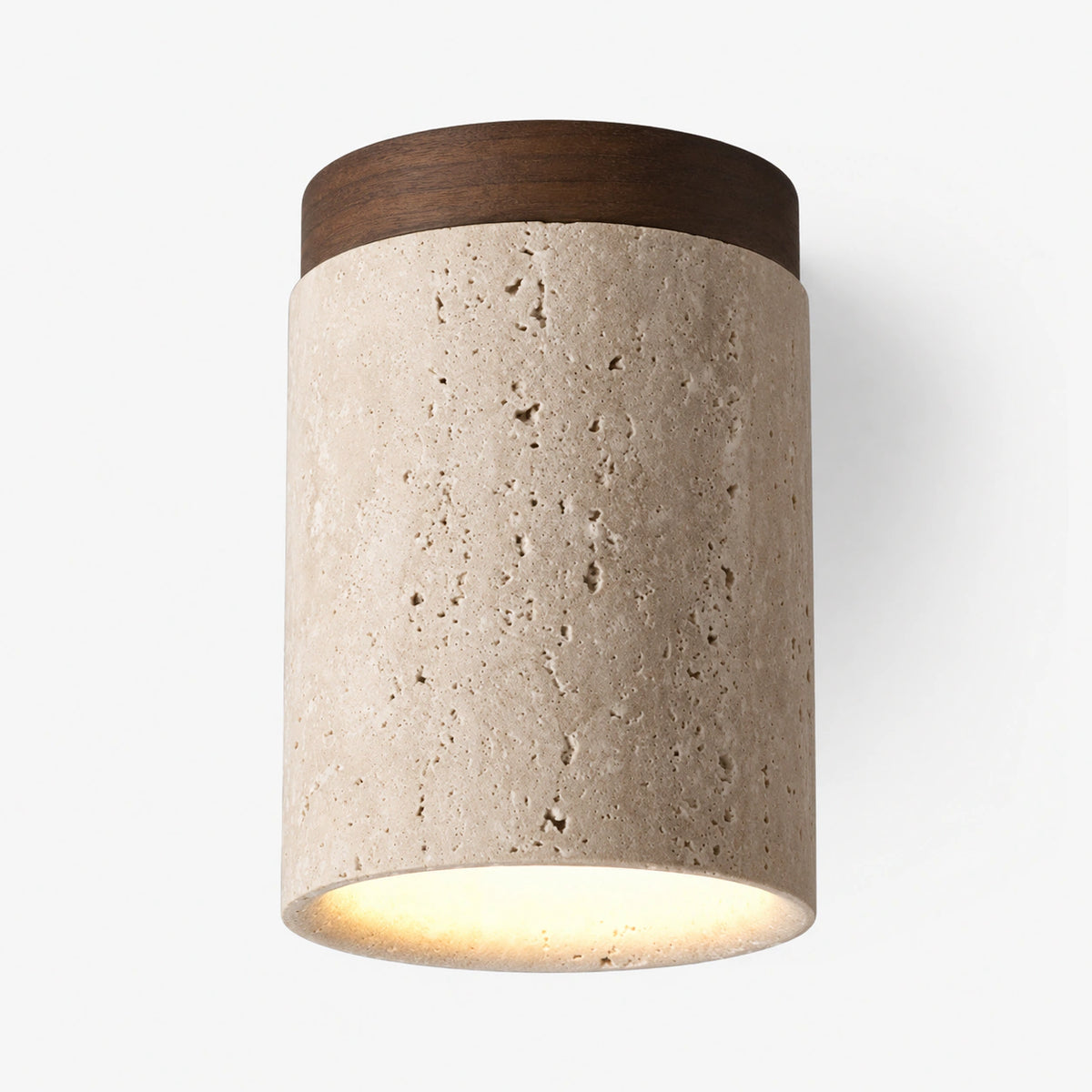 Travertine cylinder ceiling light with a walnut collar on a white background