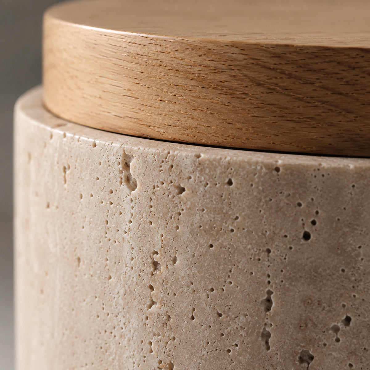 Close-up of the travertine grain on the cylinder ceiling light