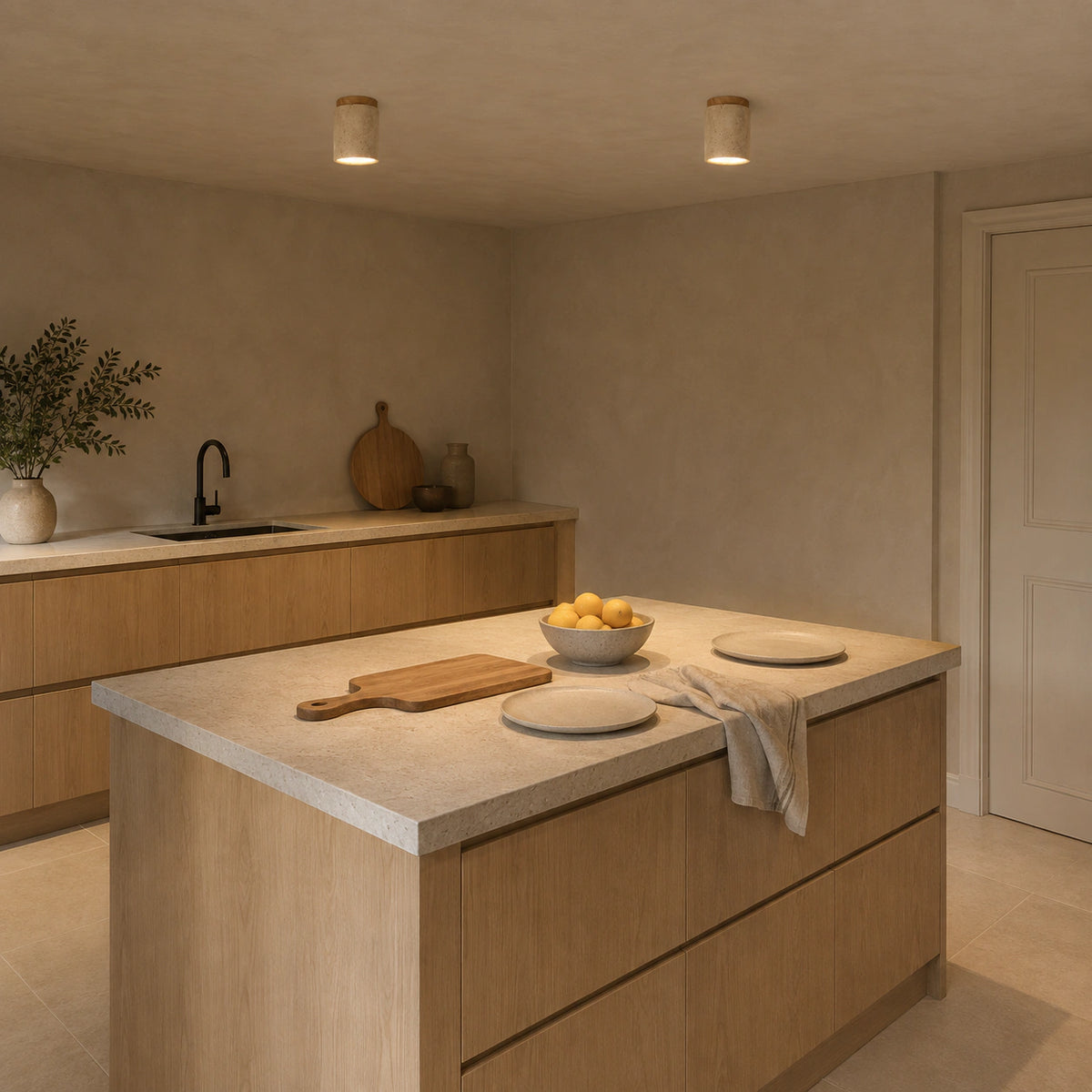 Travertine cylinder ceiling light above an oak kitchen worktop