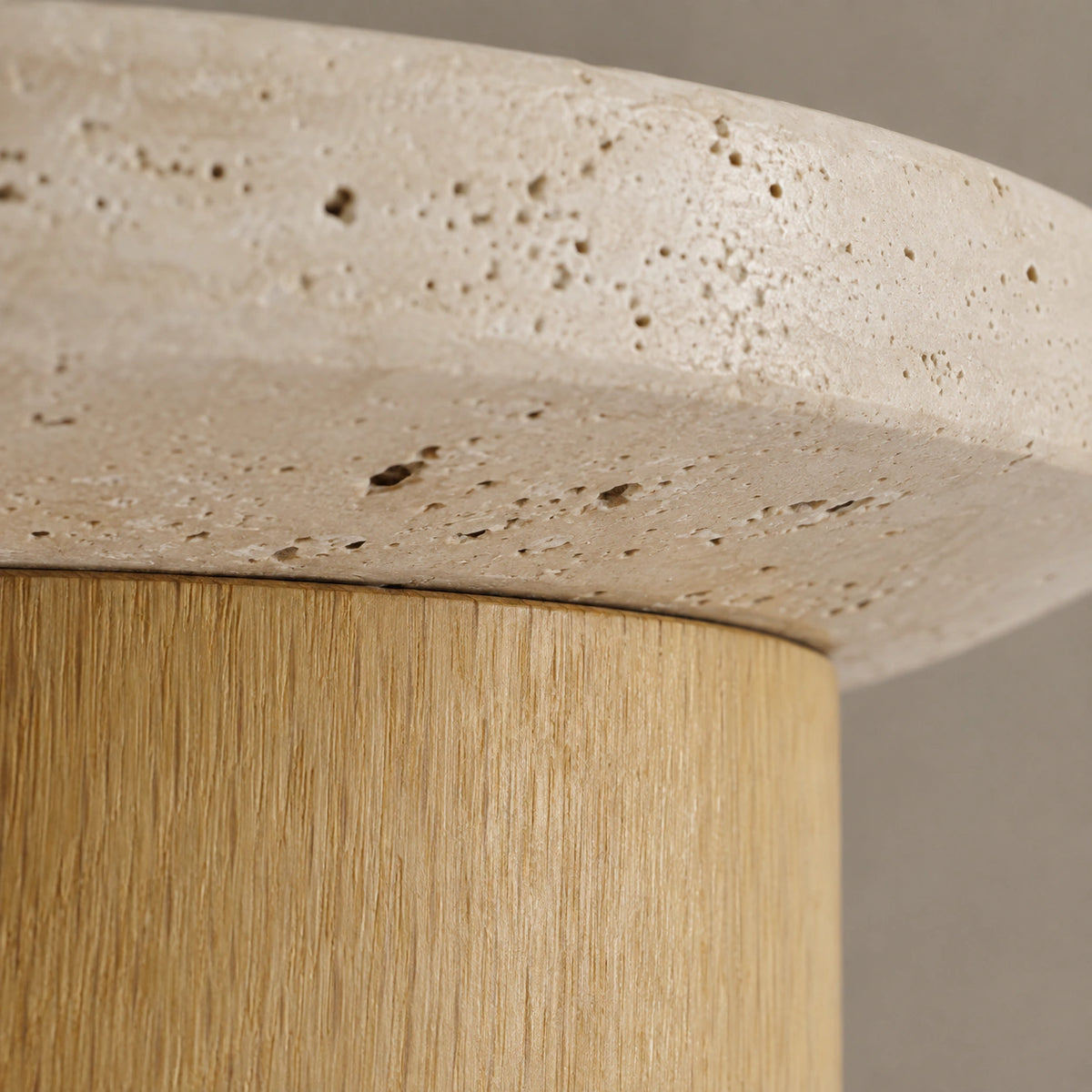 Close-up of the travertine grain on the disc ceiling light