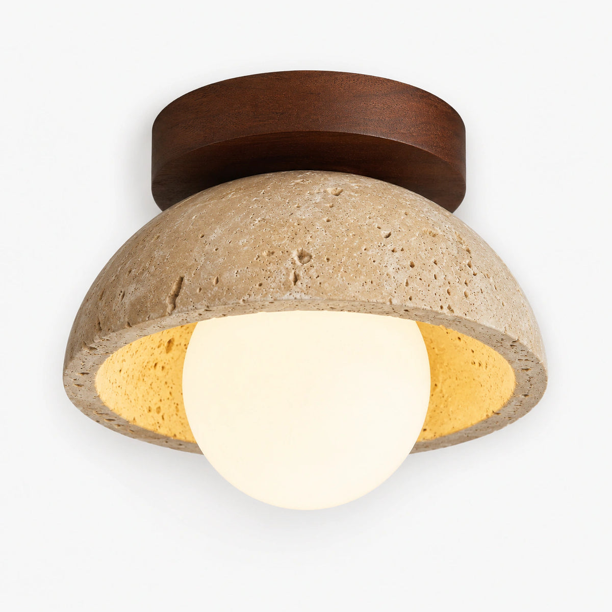 Travertine dome ceiling light with an opal globe and walnut collar on a white background