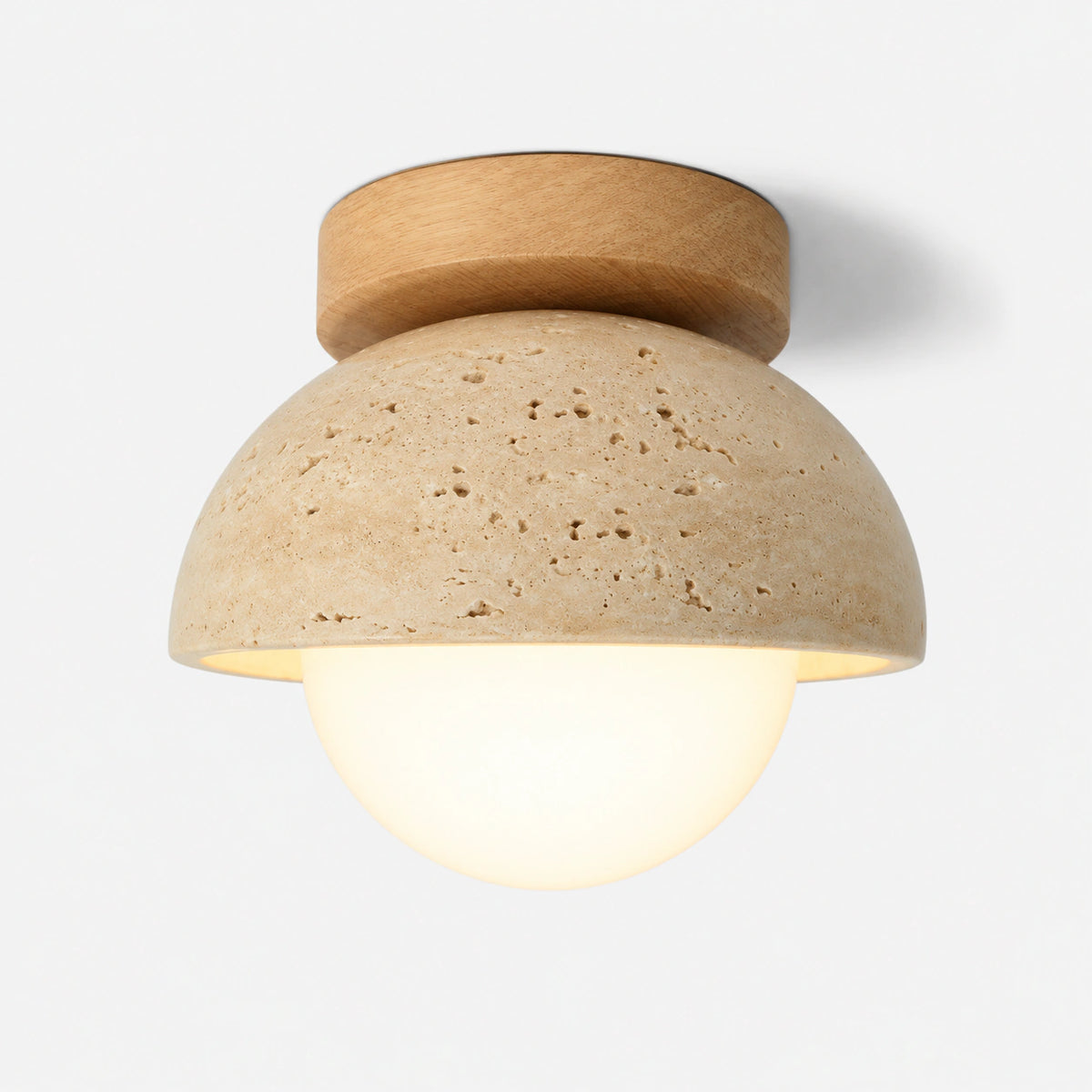 Travertine dome ceiling light with an opal globe and oak collar on a white background