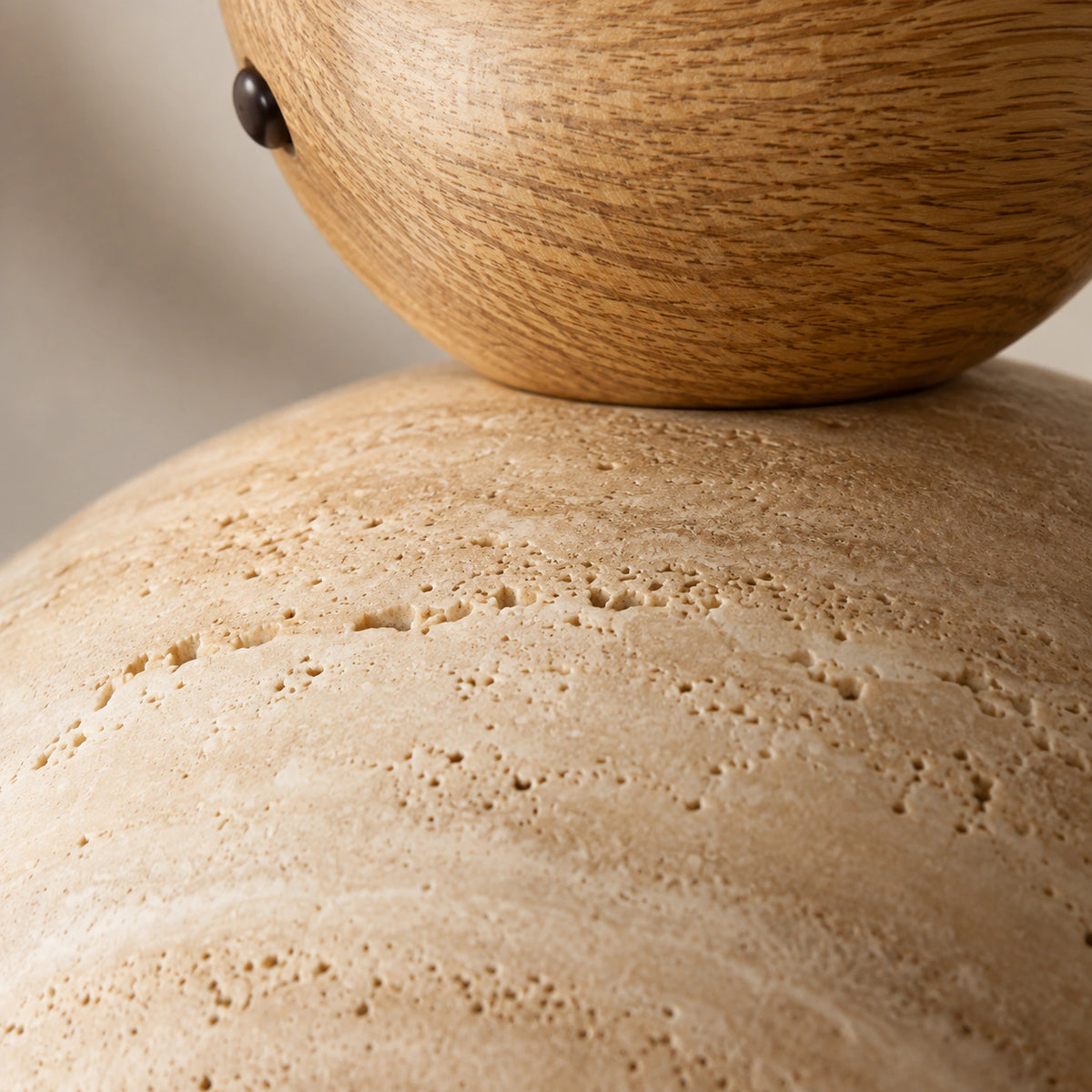 Close-up of the travertine grain on the deep dome ceiling light