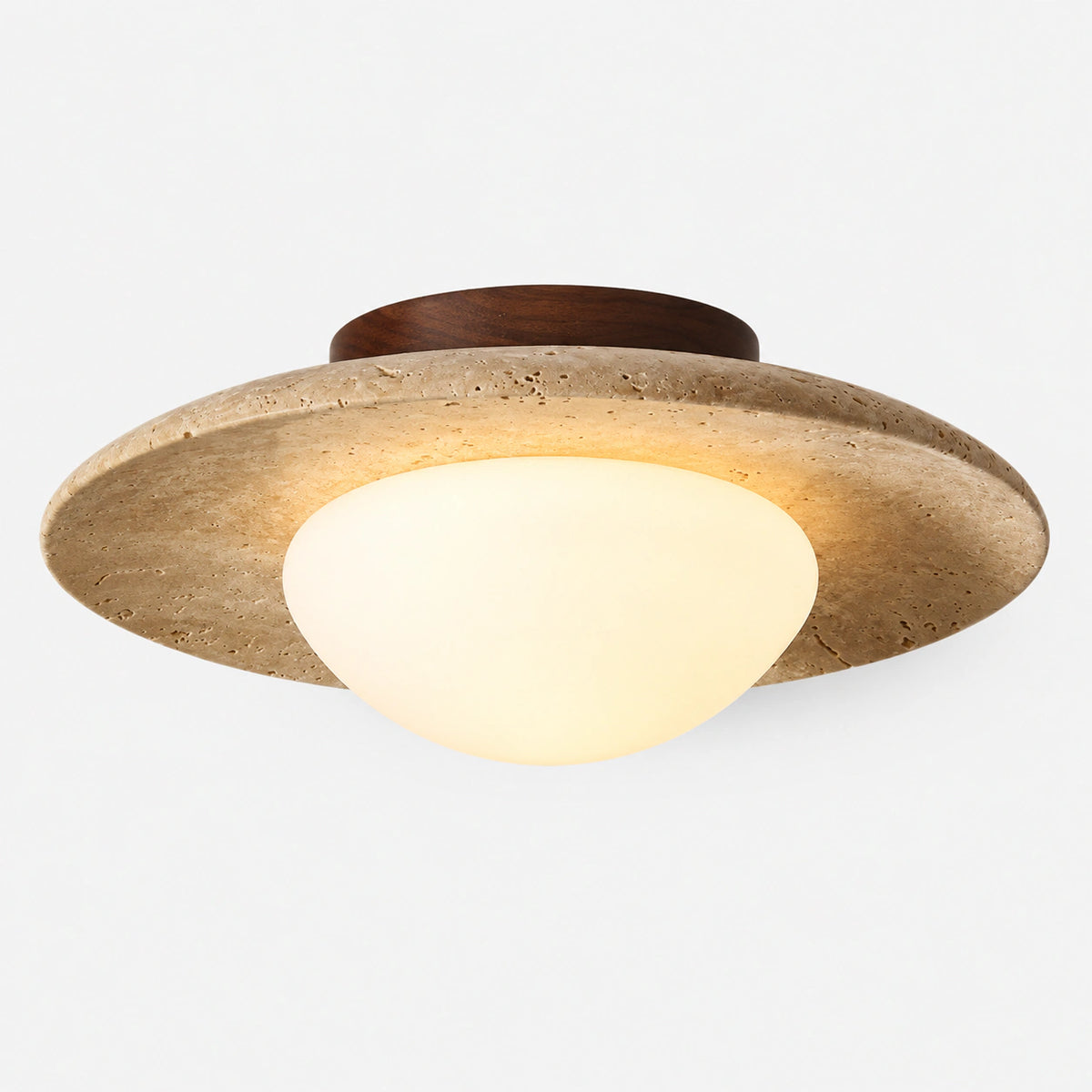 Flat travertine dish ceiling light with an opal diffuser on a white background