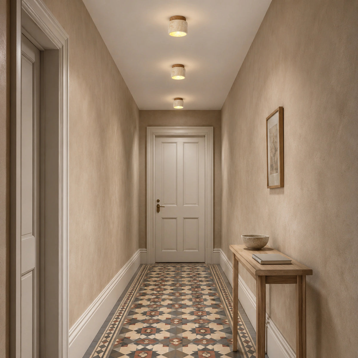 Travertine drum ceiling light with an oak fitting lighting a plastered hallway