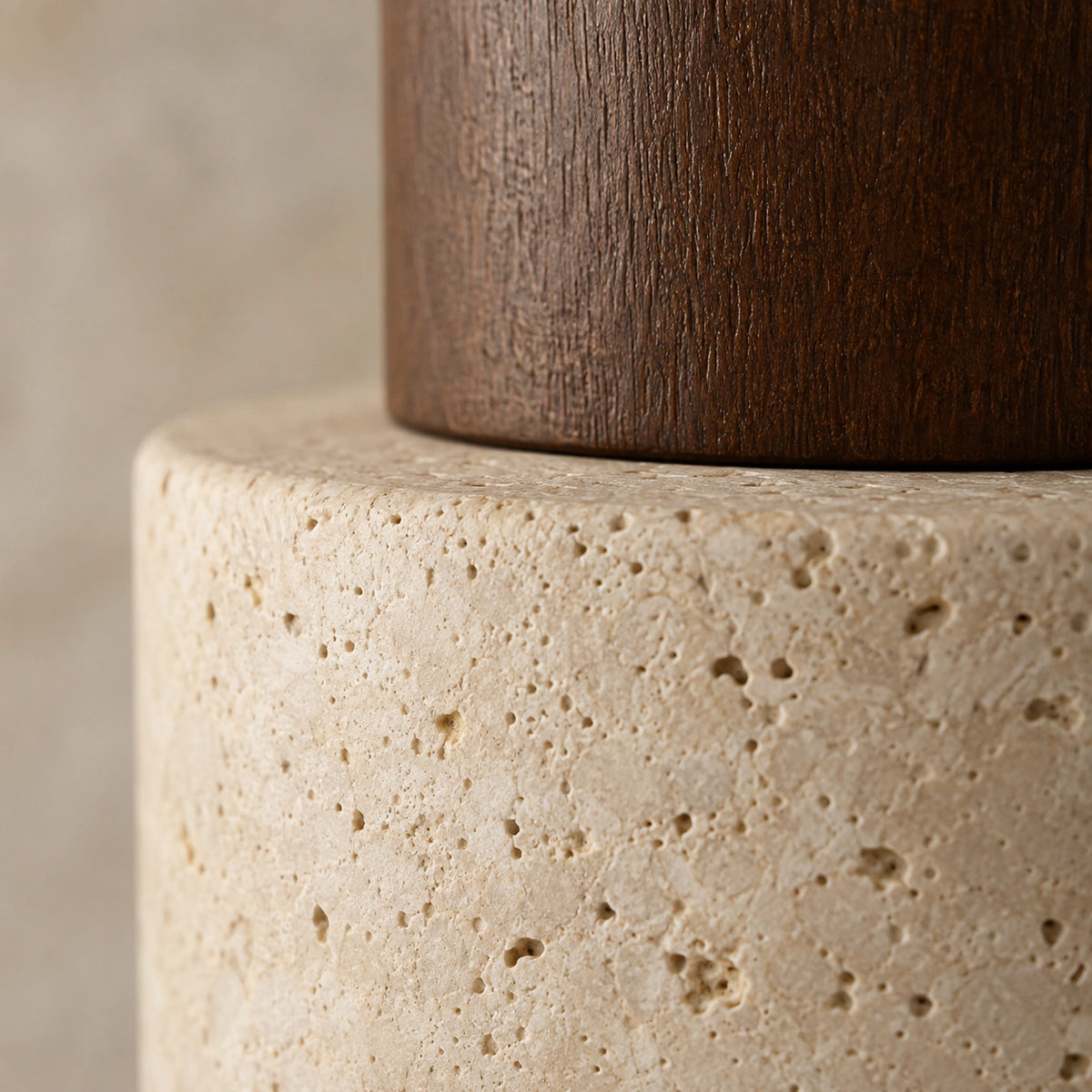 Close-up of the travertine grain on the walnut version of the adjustable drum spotlight
