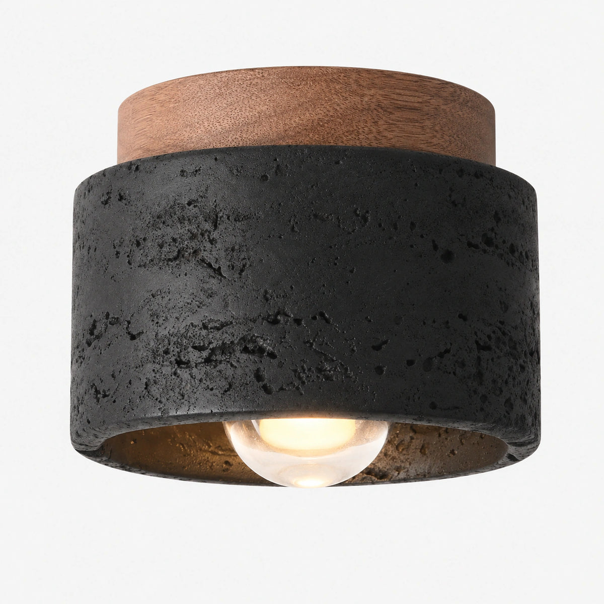 Black travertine drum ceiling light with a walnut collar on a white background