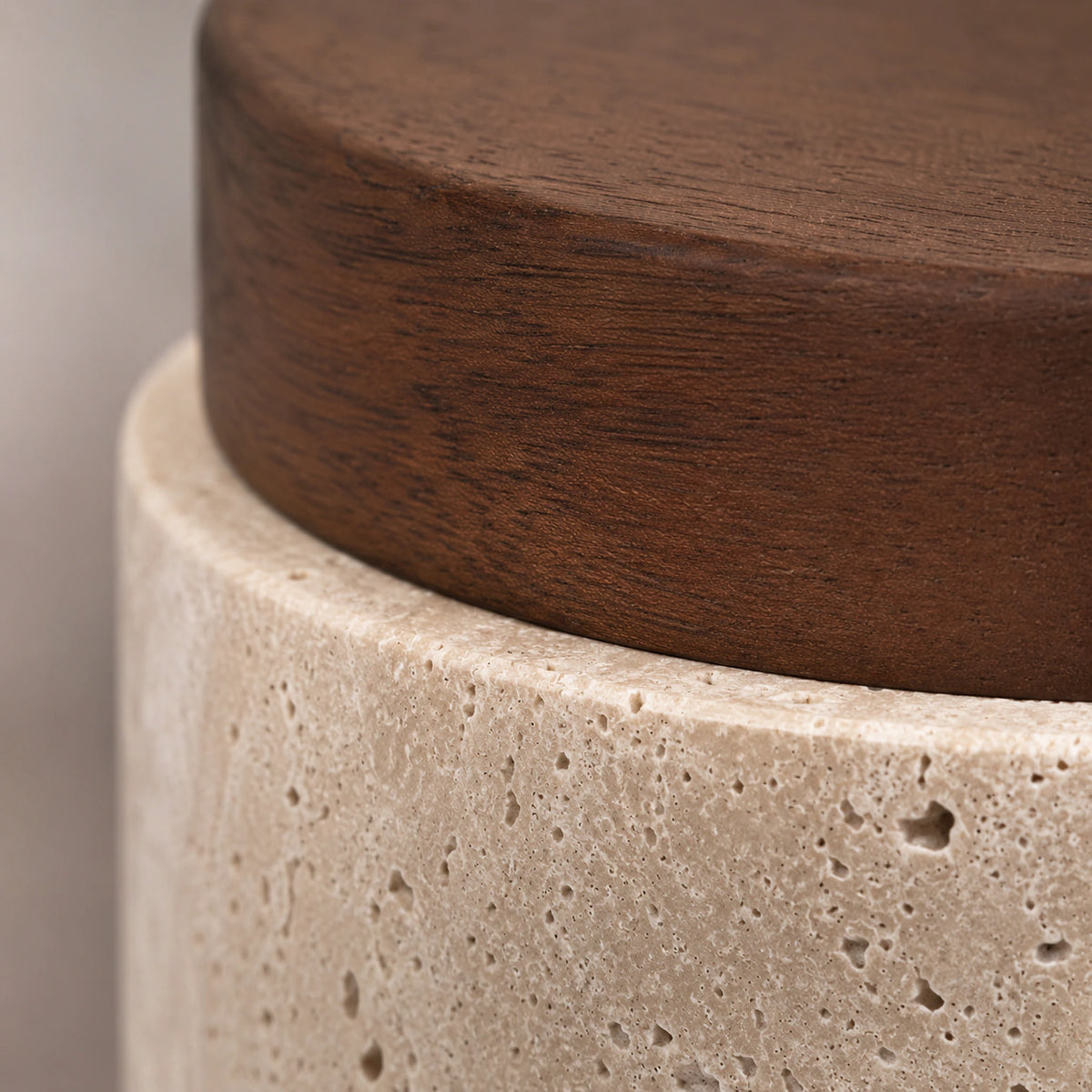 Close-up of the travertine grain on the walnut version of the drum ceiling light