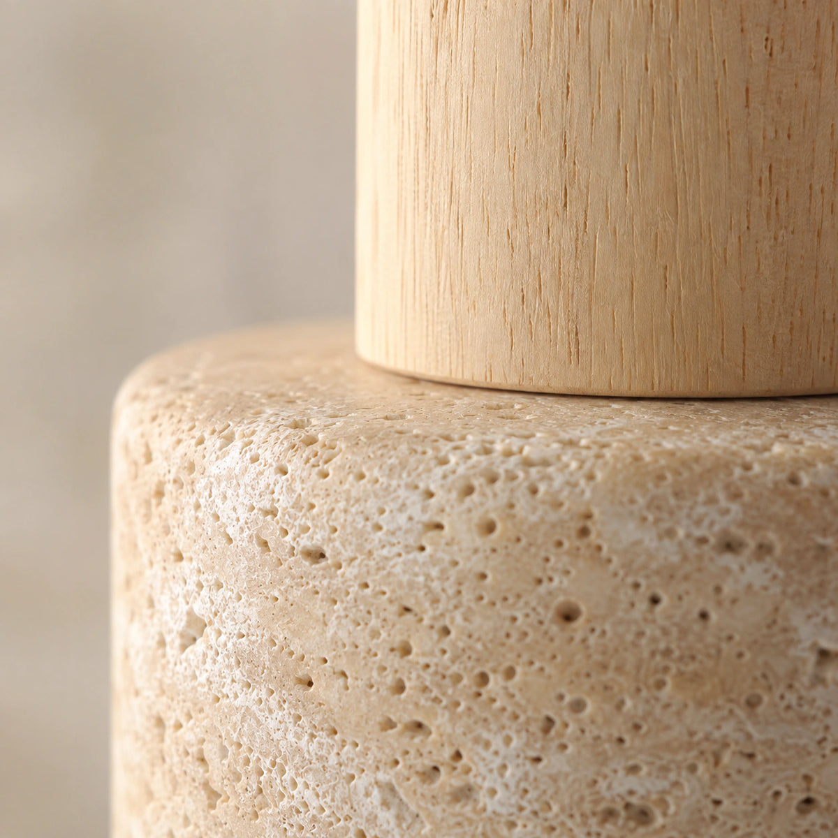 Close-up of the travertine grain on the adjustable drum spotlight