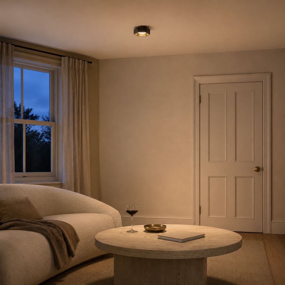 Black travertine hexagonal ceiling light in a calm neutral living room