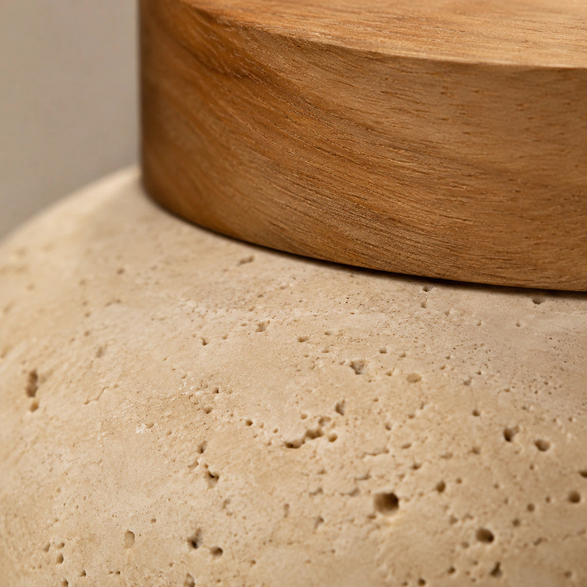 Close-up of the travertine grain on the pebble flush ceiling light