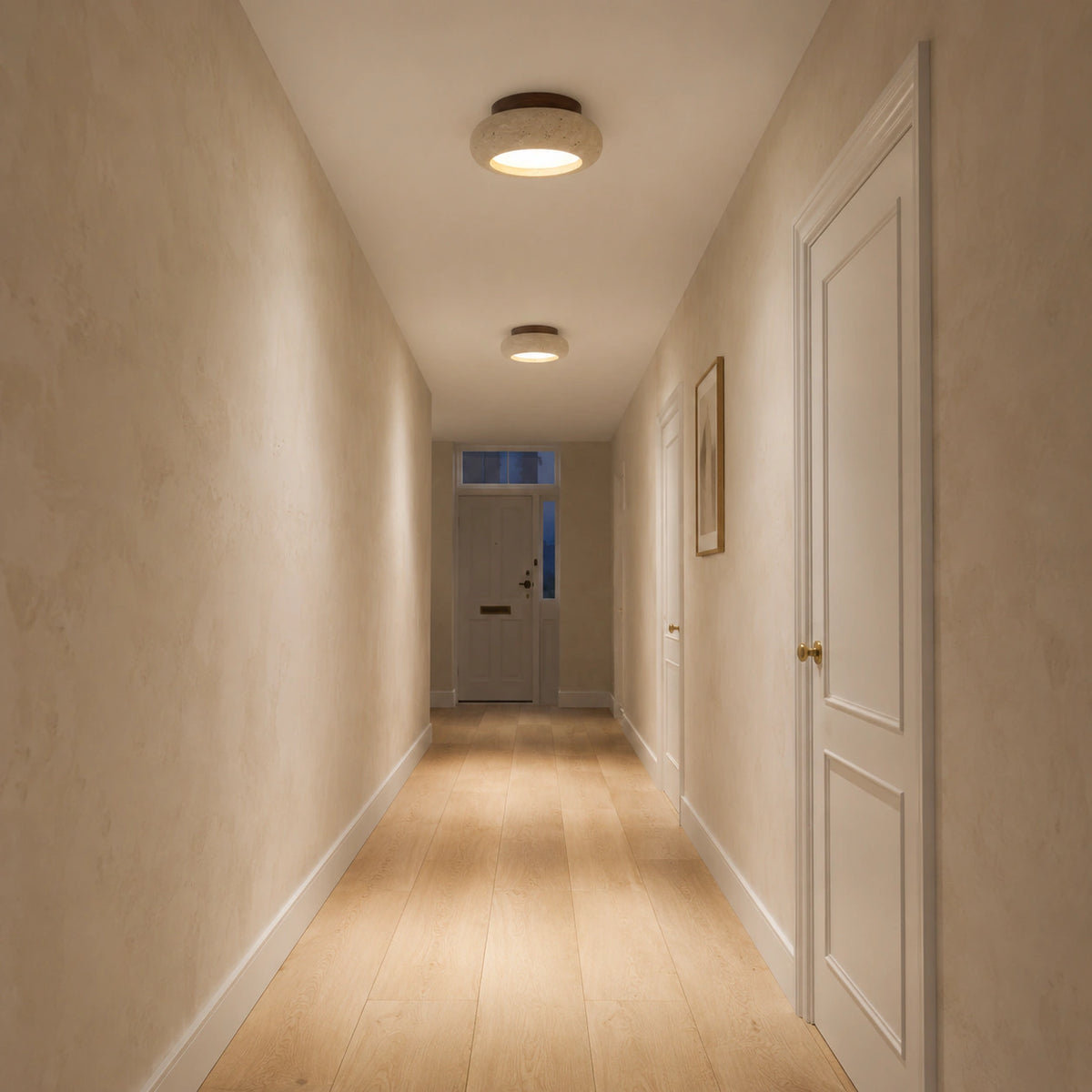 Travertine pebble flush ceiling light on a hallway ceiling in a period home