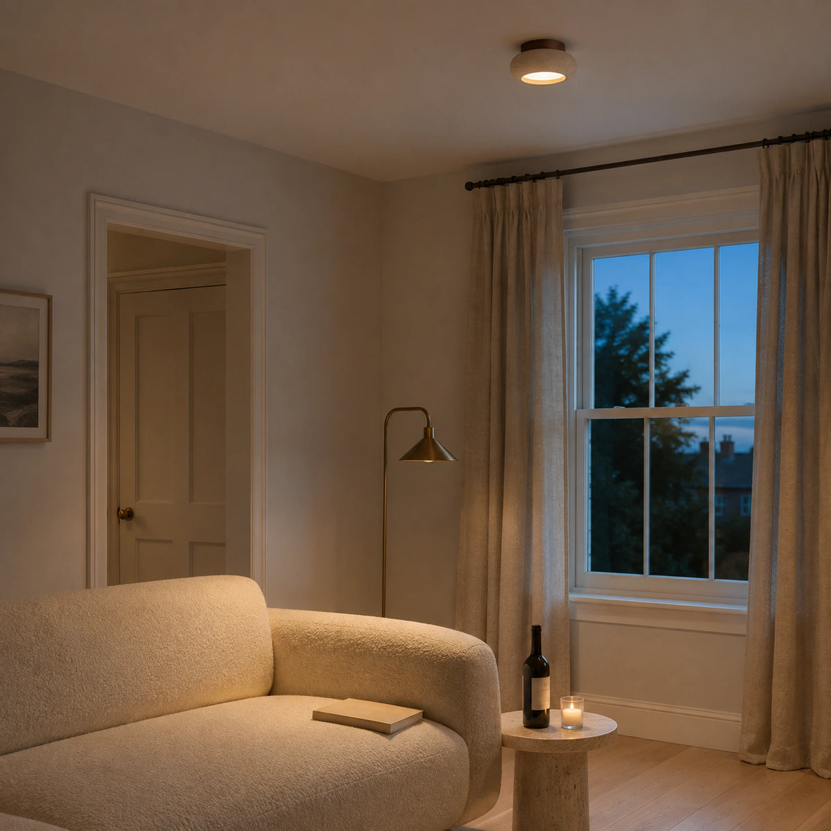 Travertine pebble flush ceiling light in a calm neutral living room