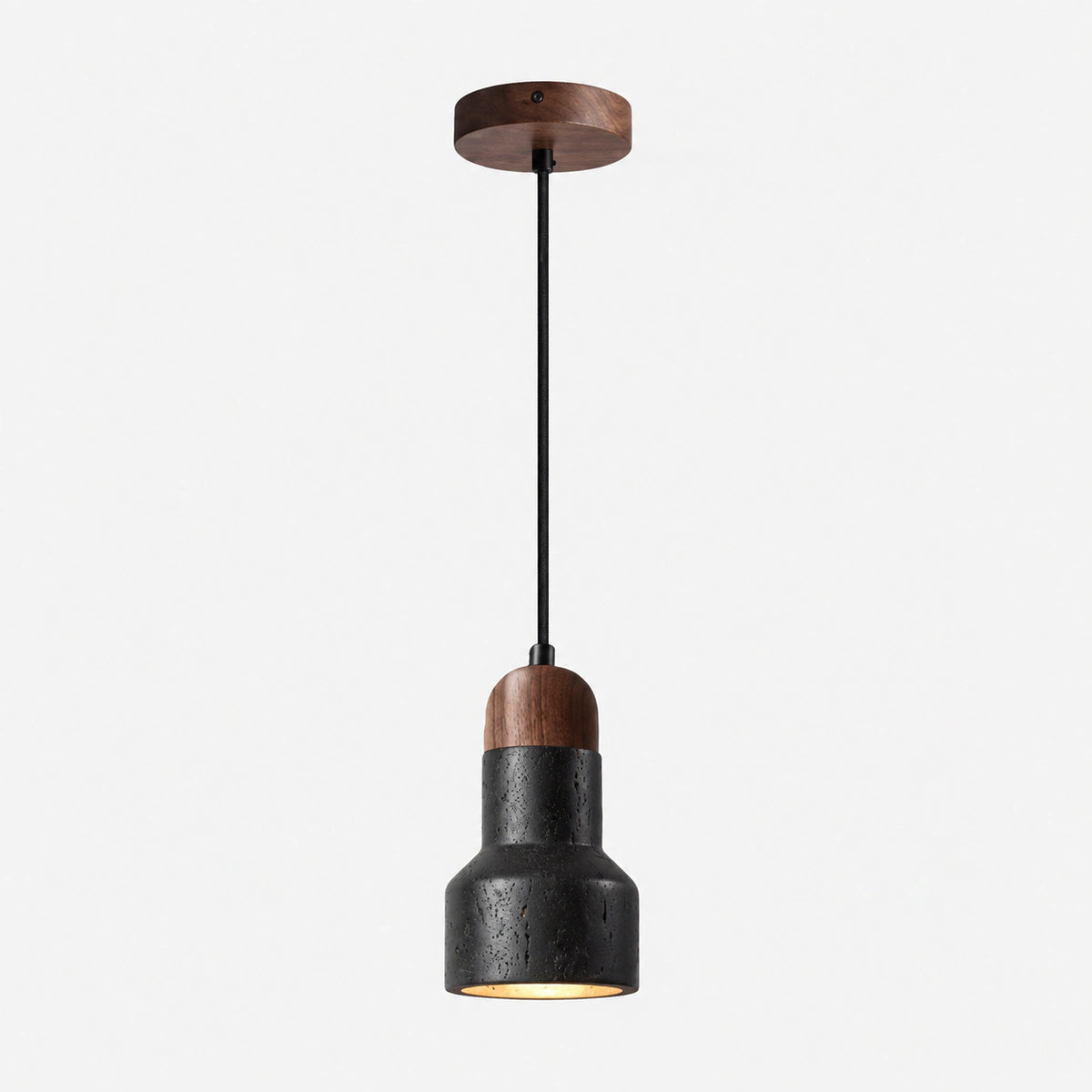 Black travertine bell pendant light with a walnut neck on a white background