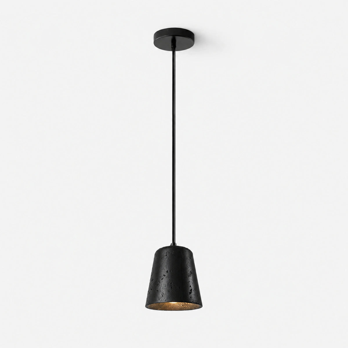 Small black travertine bell pendant light with a black iron ceiling plate on a white background