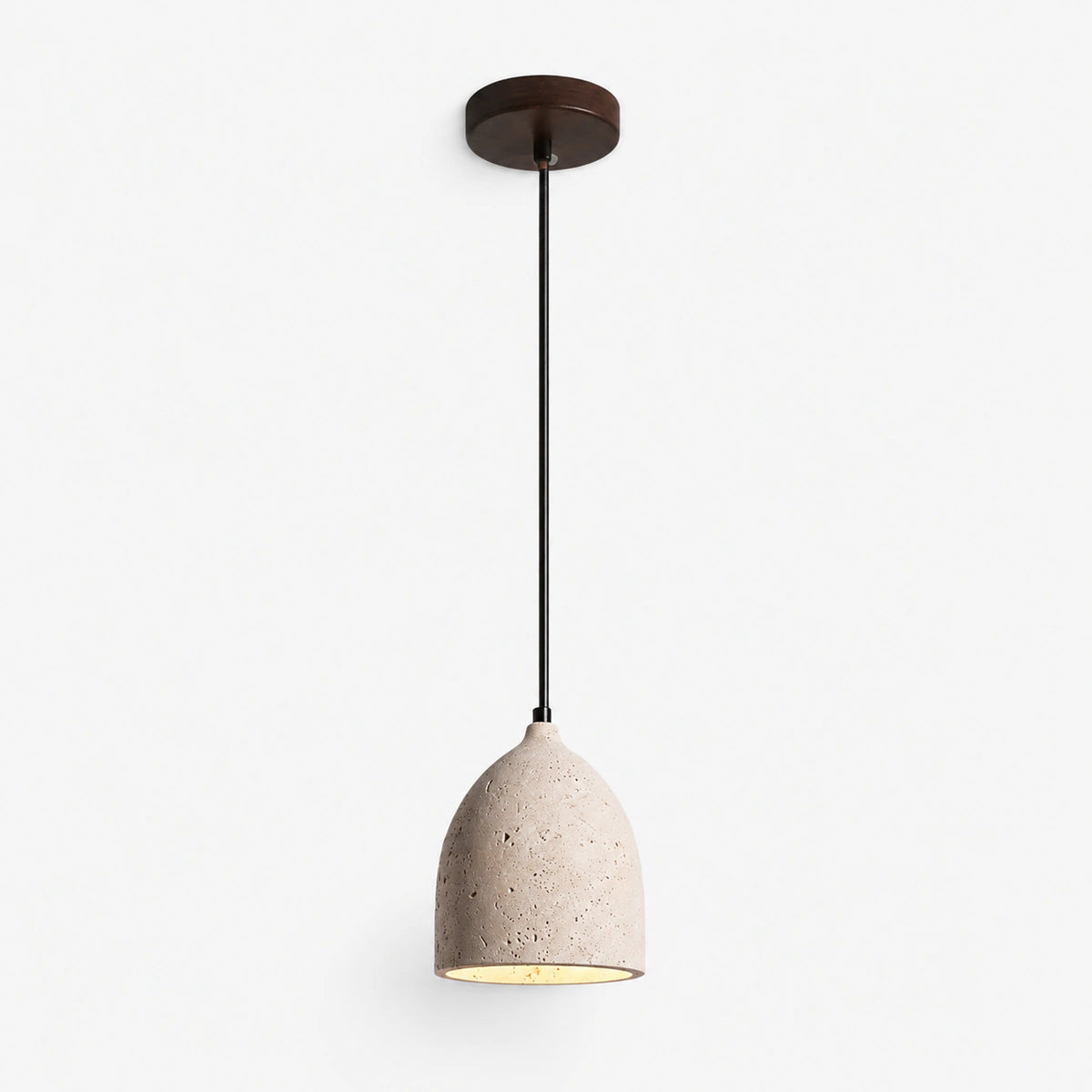 Cream travertine bell pendant light with no visible fixings on a white background