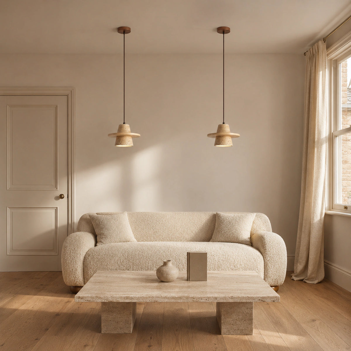Travertine cone pendant in a calm neutral living room