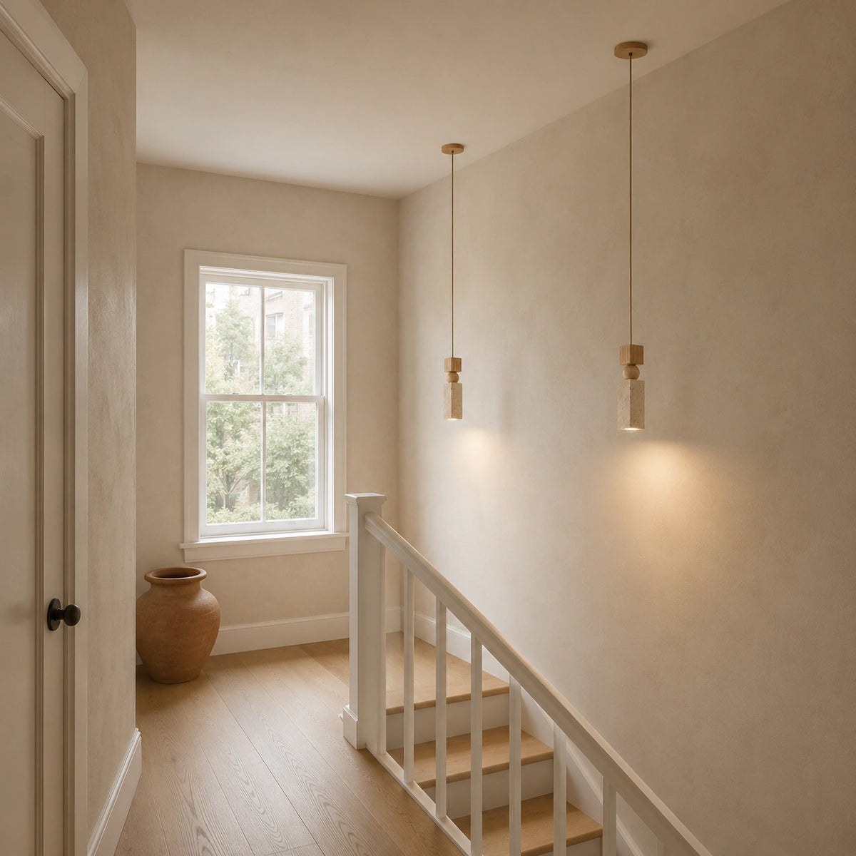 Cranbrook square travertine pendant hanging above a staircase landing