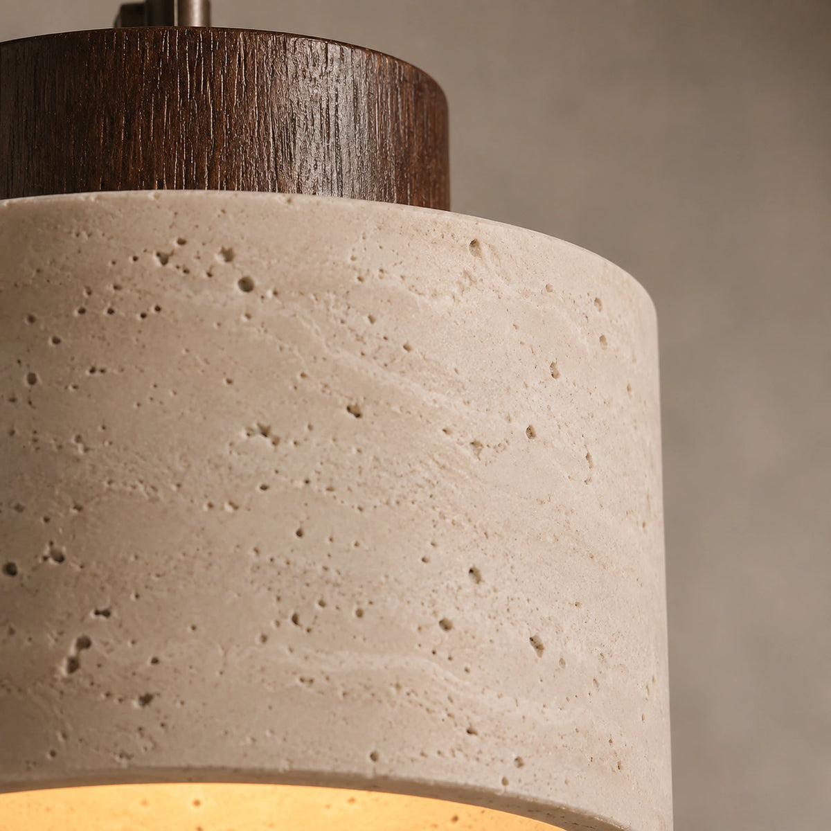 Close-up of the travertine grain running the full height of the Fairlie cylinder in walnut