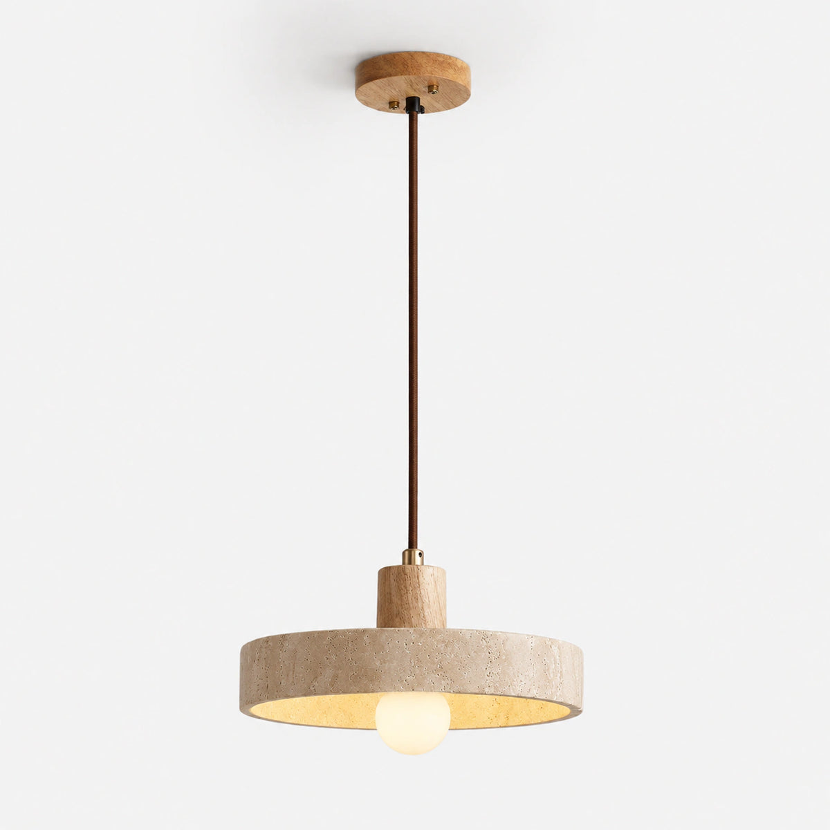 Wide travertine disc pendant light with an oak collar on a white background