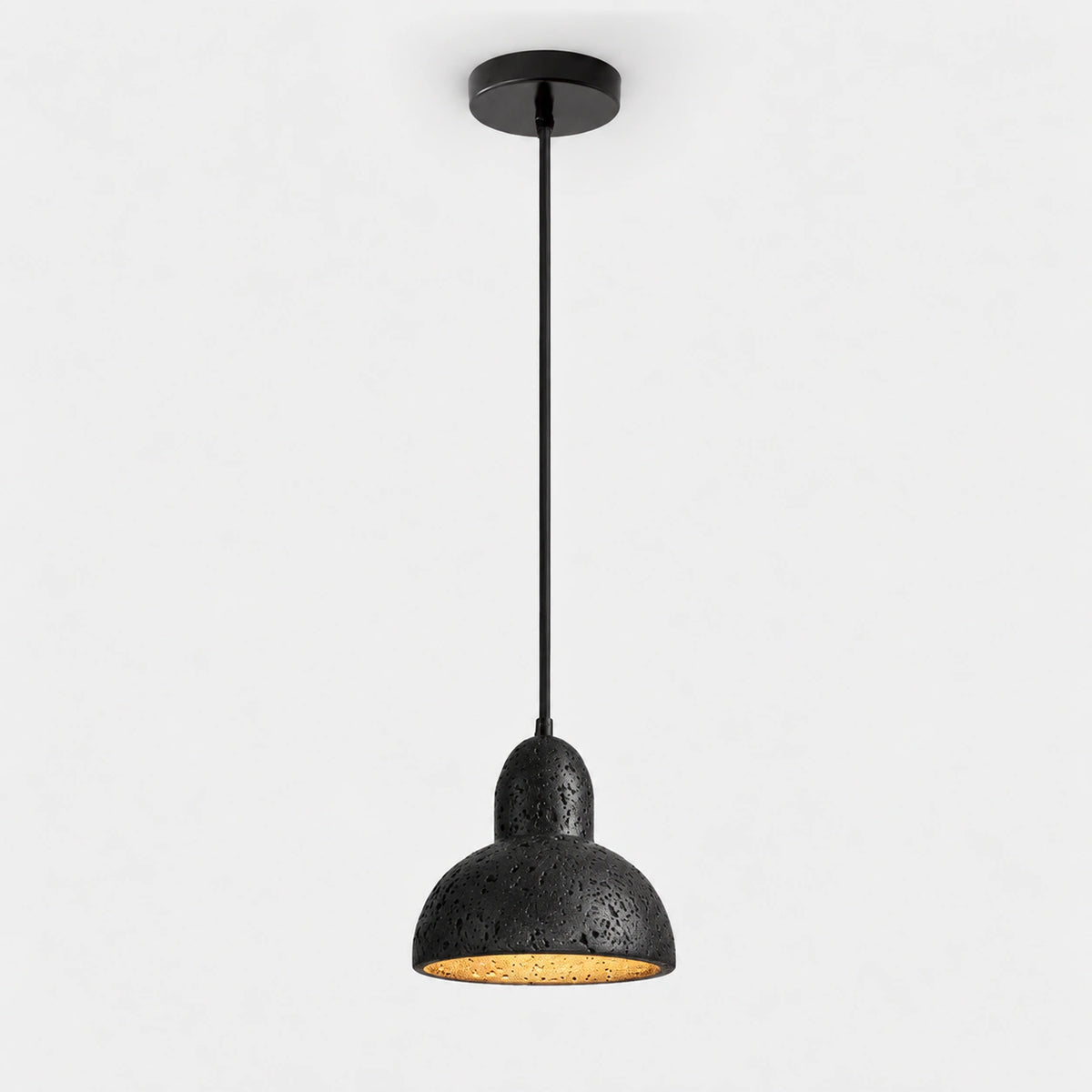 Black travertine dome pendant light with a black iron ceiling plate on a white background