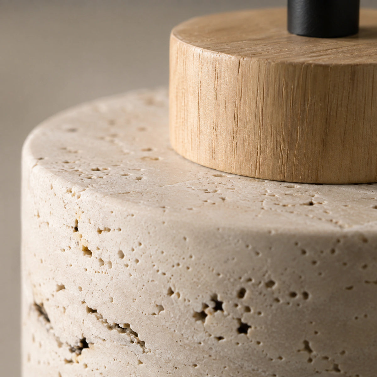 Close-up of the travertine grain and oak collar on the Whitby drum pendant
