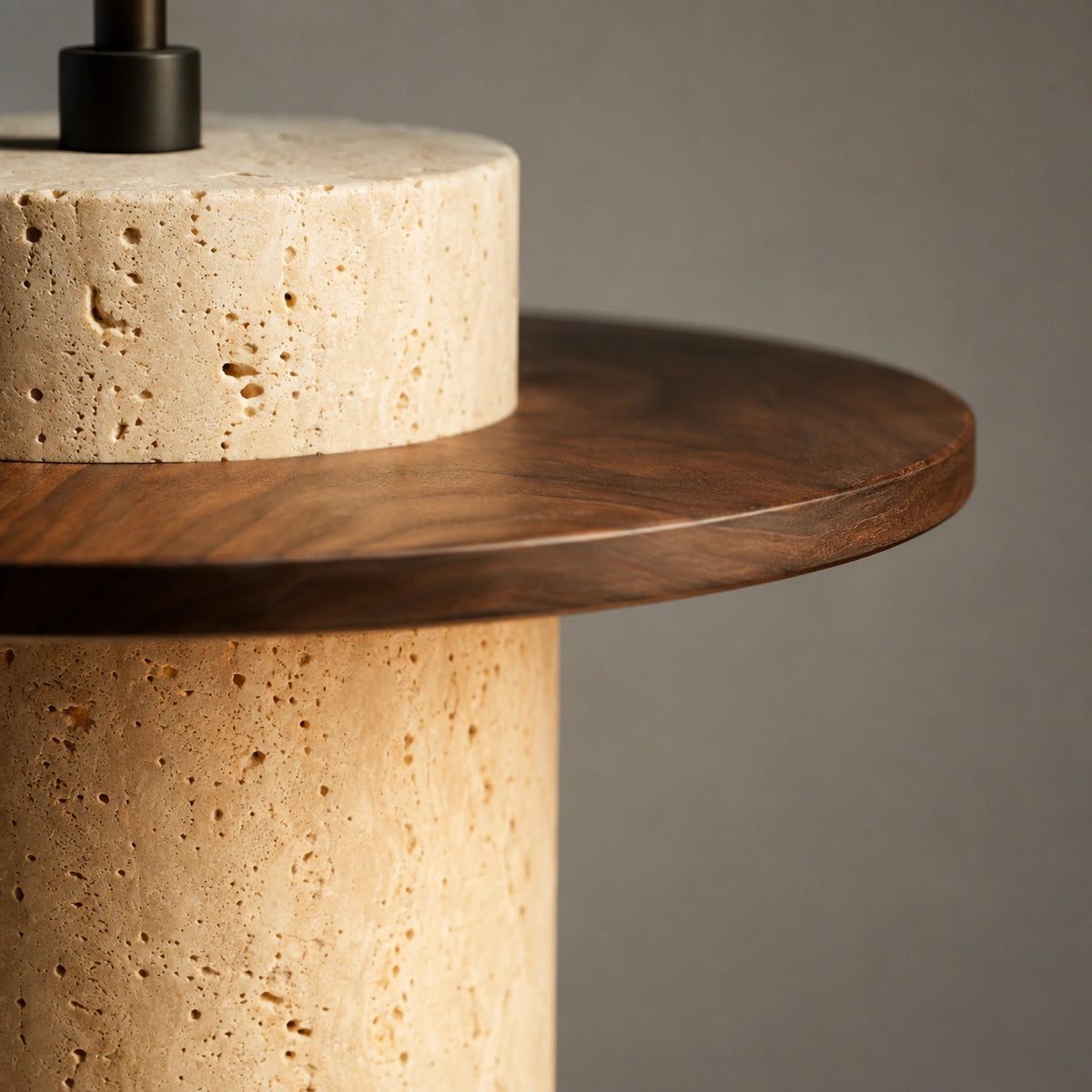 Close-up of the cream travertine drum and walnut brim on the Hatfield pendant