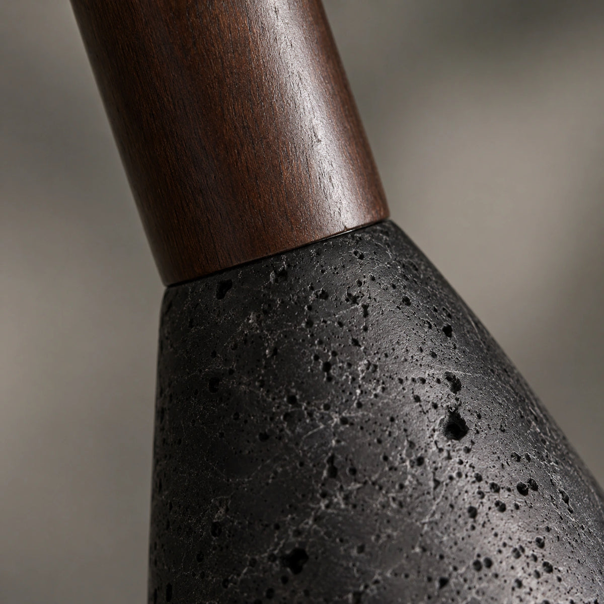 Close-up of the black travertine and turned wood neck on the Coalbrook pendant