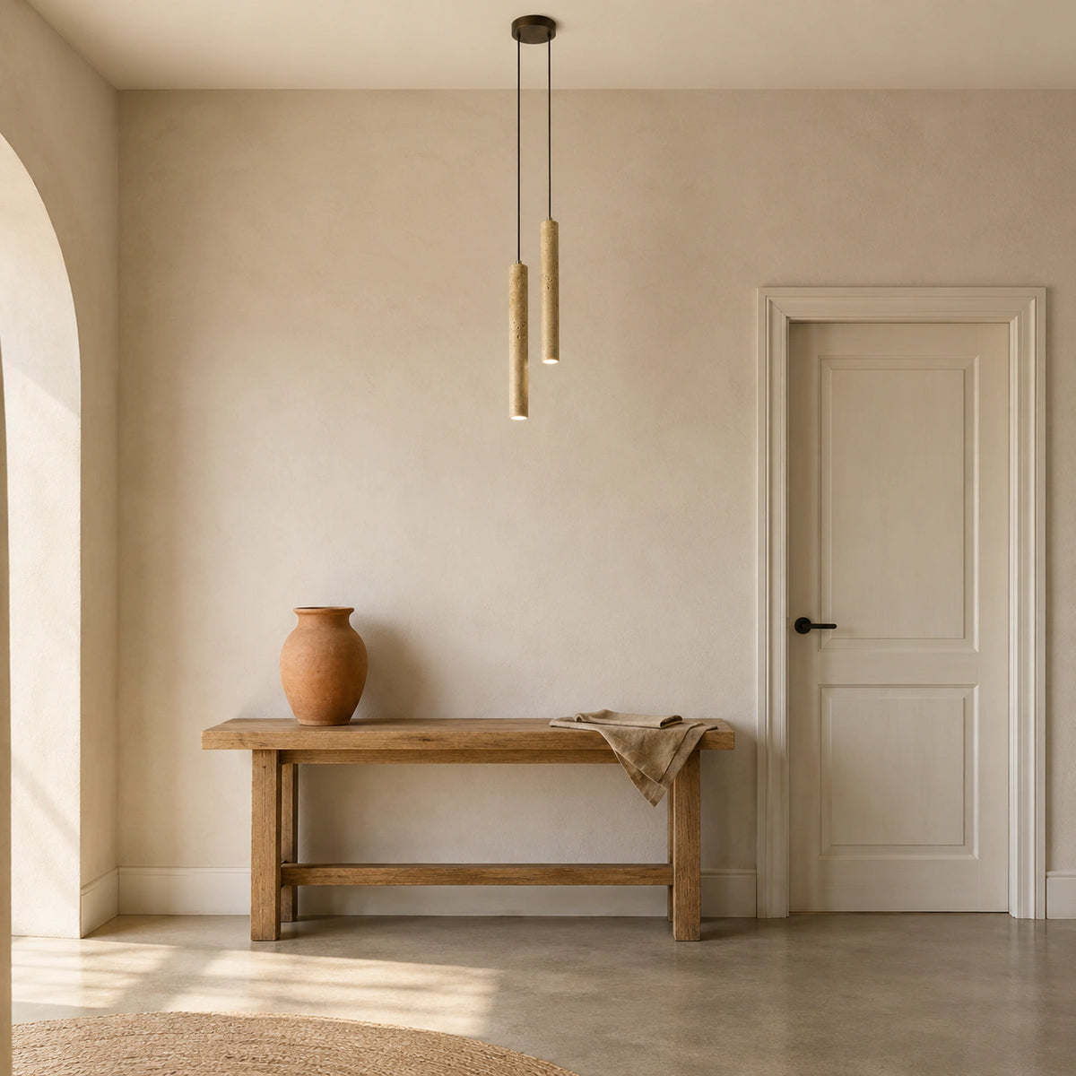 Chesil travertine tube cluster pendant lighting a hallway in a period property