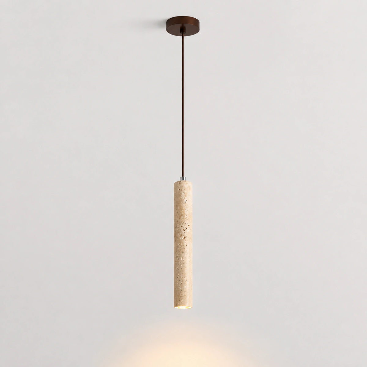 Slim travertine tube pendant light, 40 cm long, on a white background