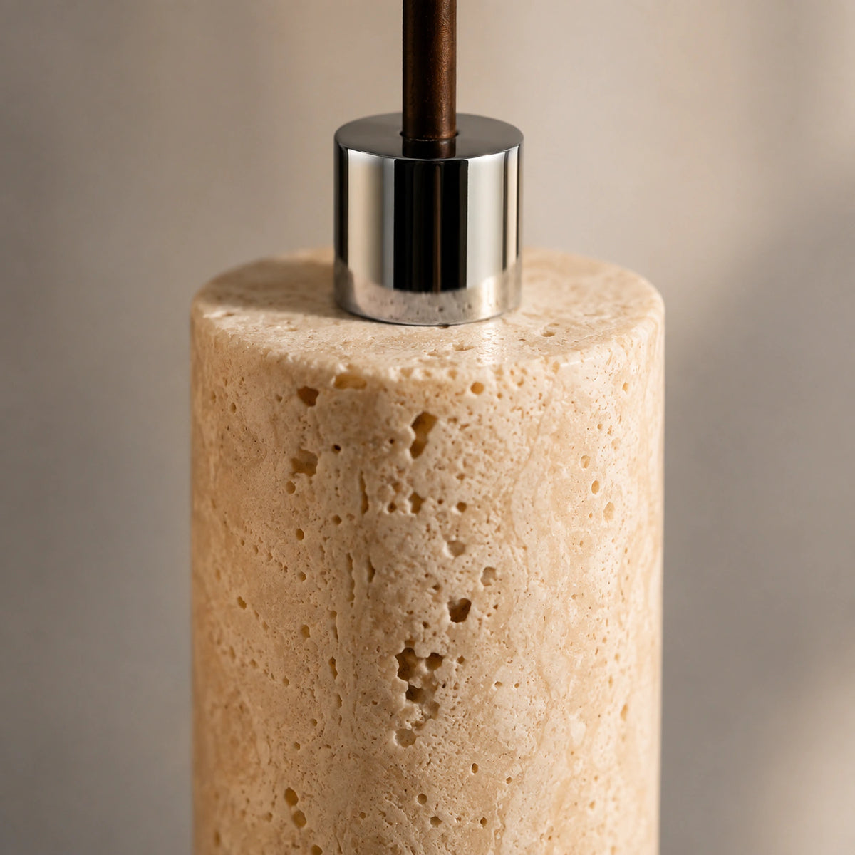 Close-up of the travertine grain on the 40 cm Reed tube pendant