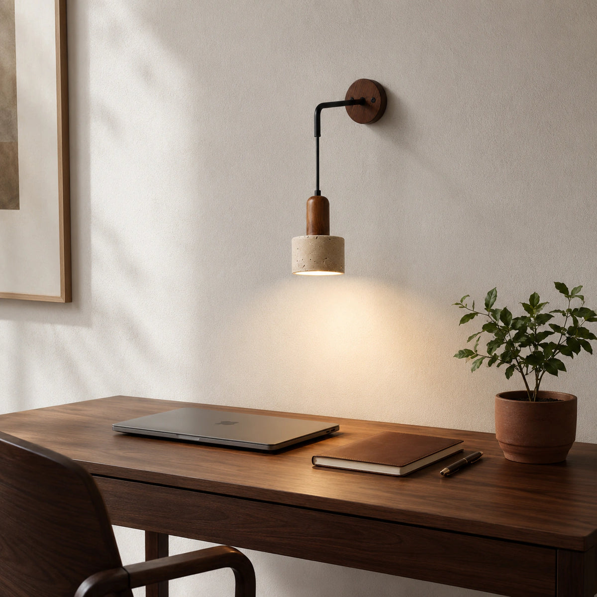 Harlyn travertine wall light above a desk in a calm home office