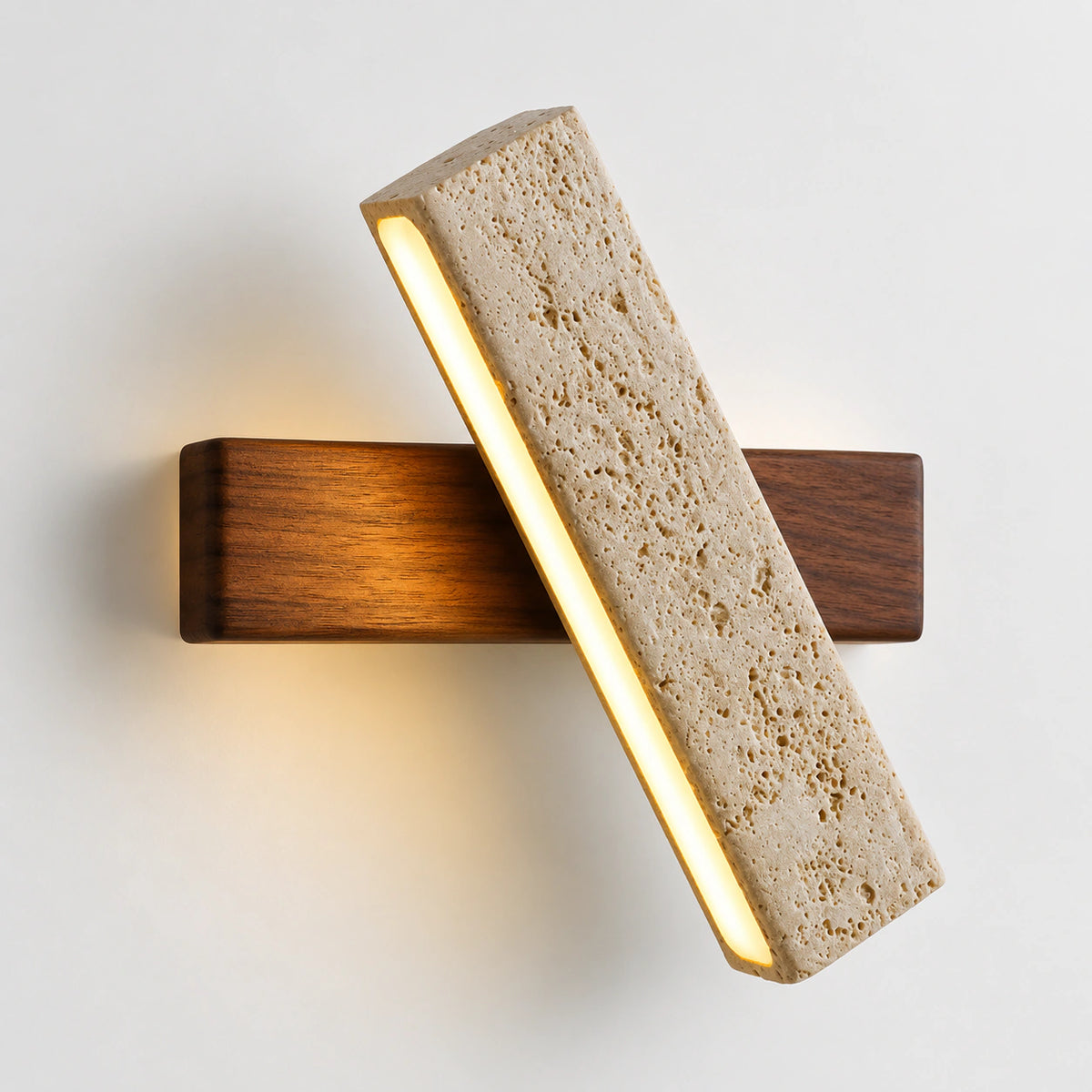 Honey travertine bar wall light crossing a walnut backplate at an angle