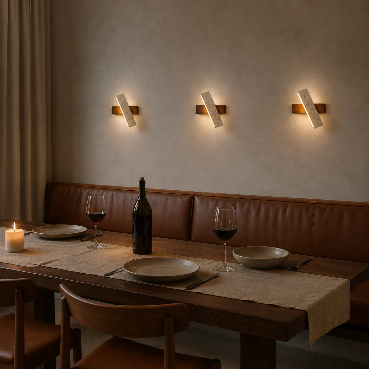 Linton linear travertine wall light on a restaurant wall