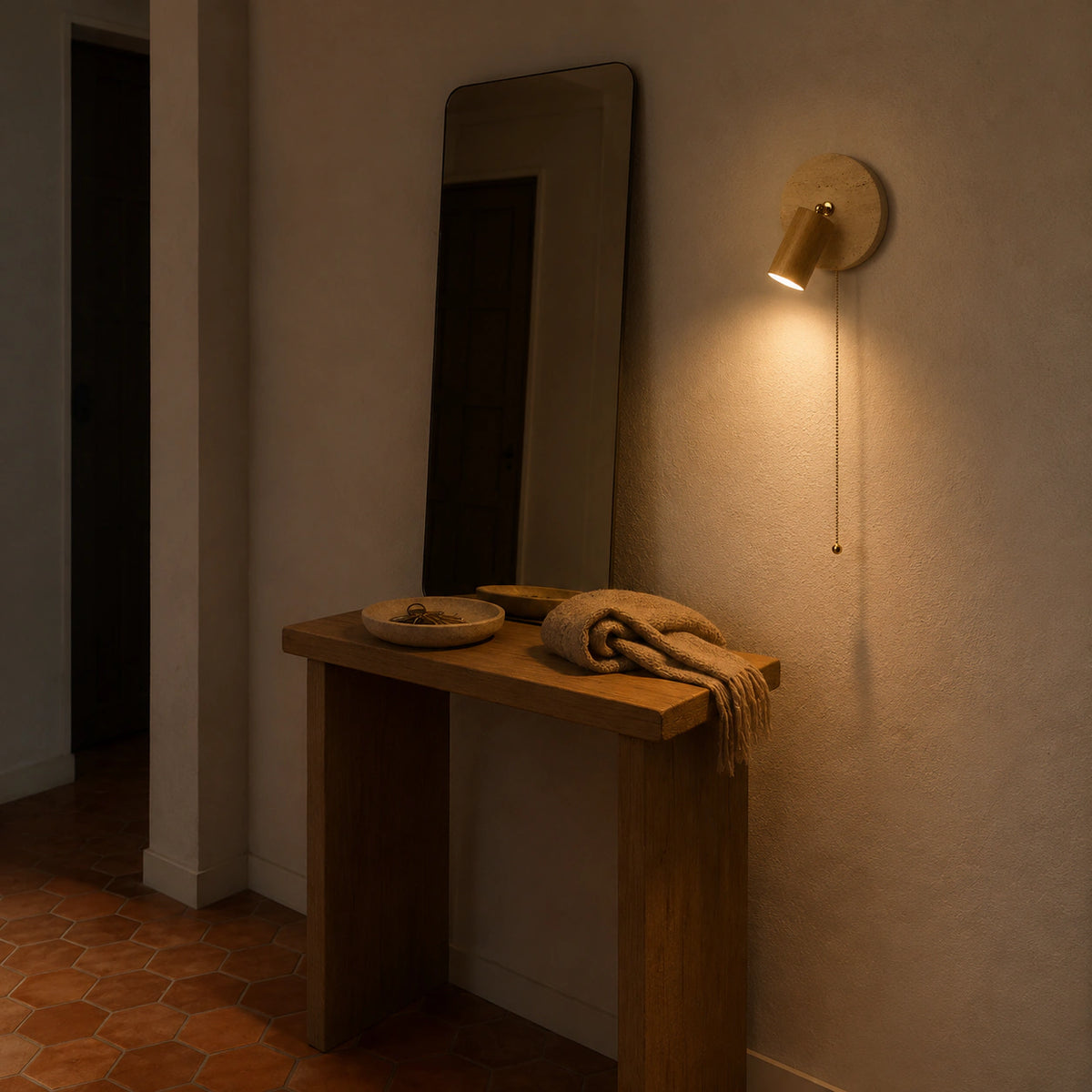 Bramfield wall light in oak aimed along a hallway wall